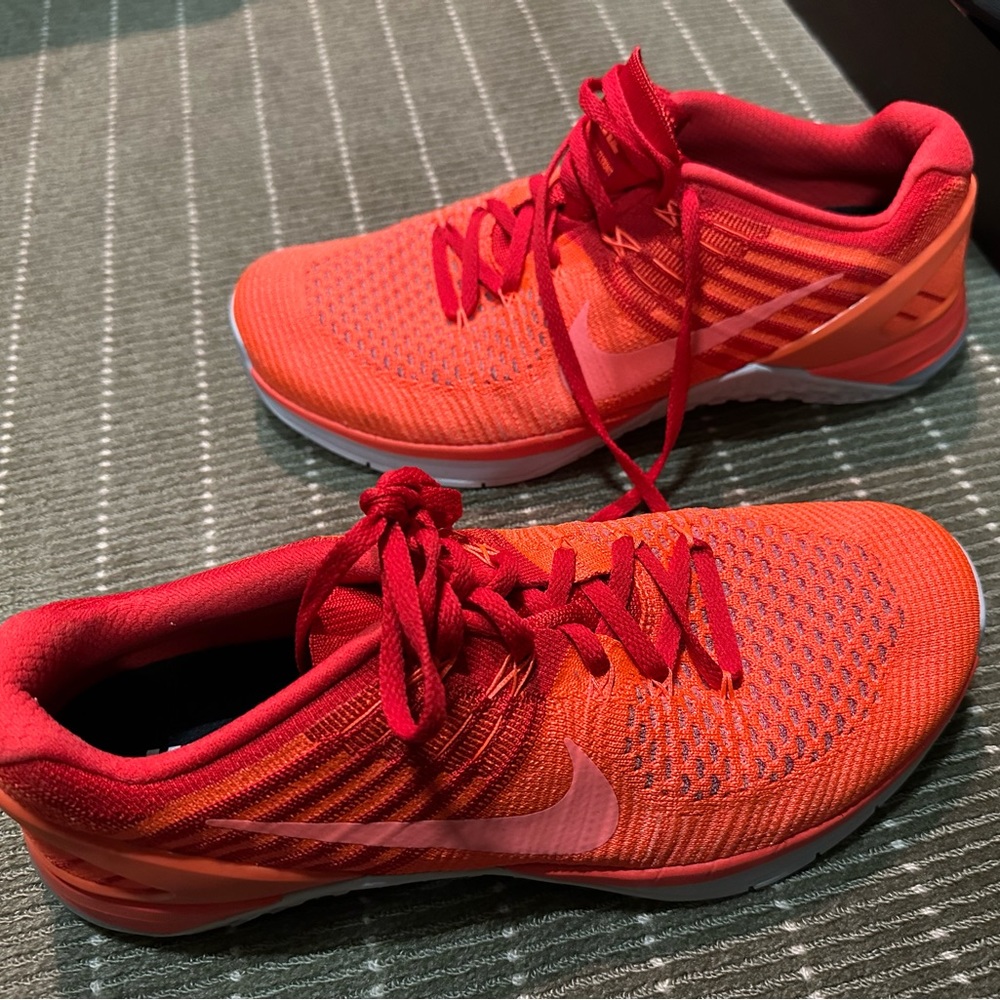 Orange Nike gym shoes